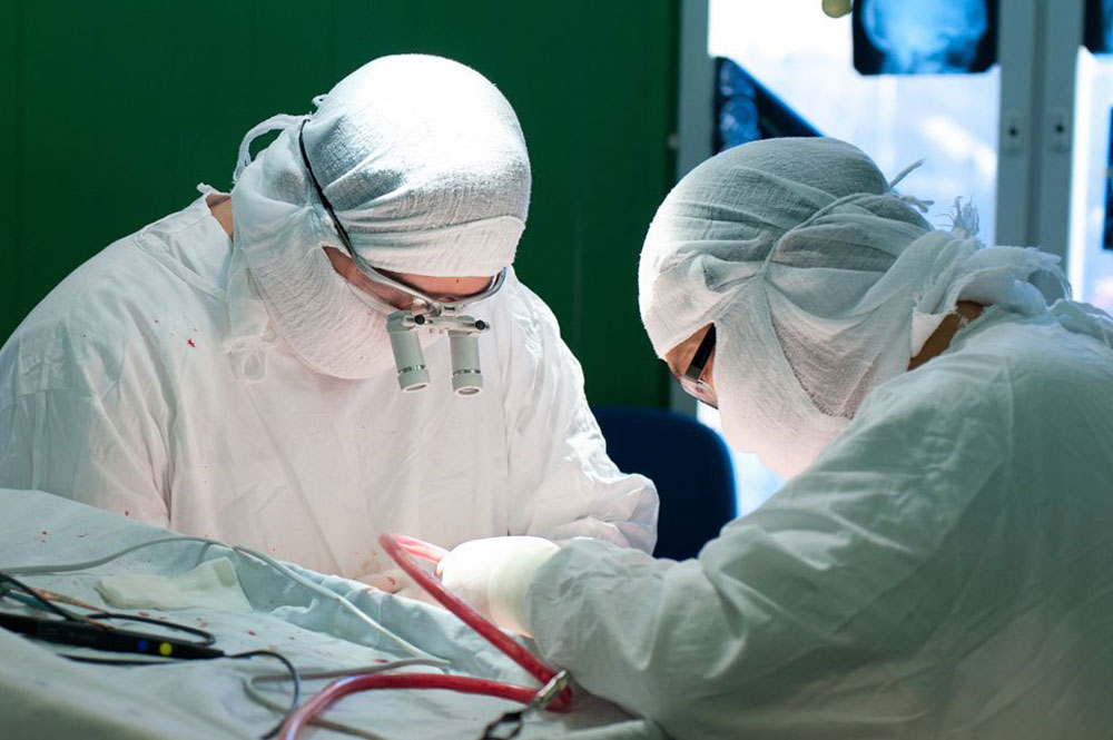 Doctors performing surgery