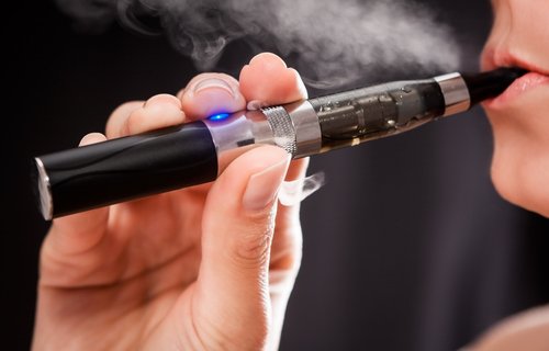 Person smoking e-cigarette