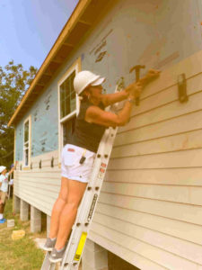 Staff volunteering at Bar and Bench Build