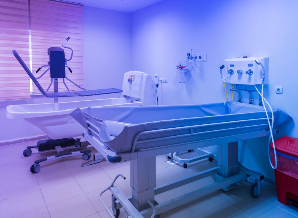 hospital room of the burn center with treatment bed and tub