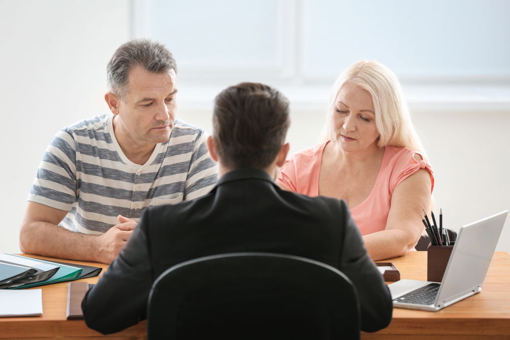 Mature couple with lawyer